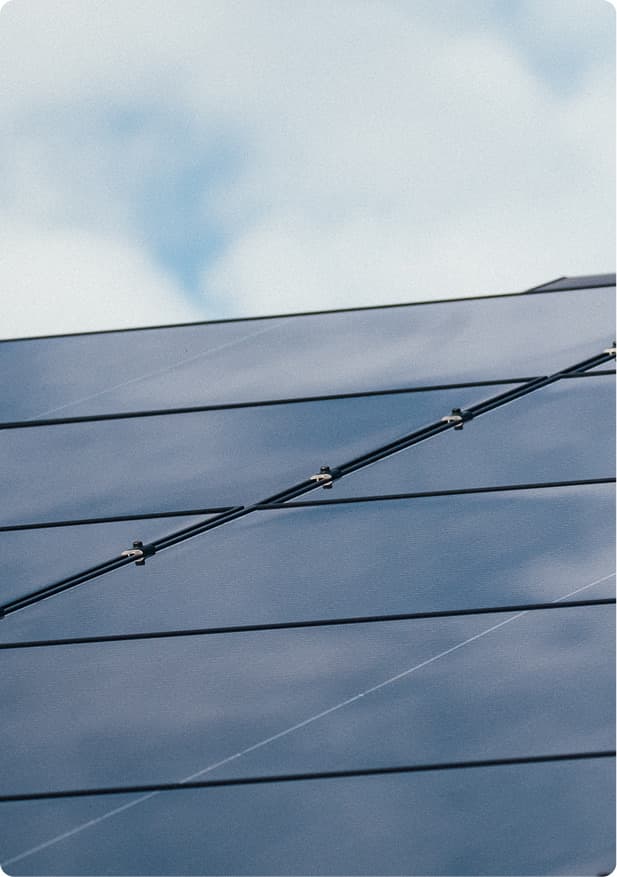 Sunrun partnership — solar panels on a home roof